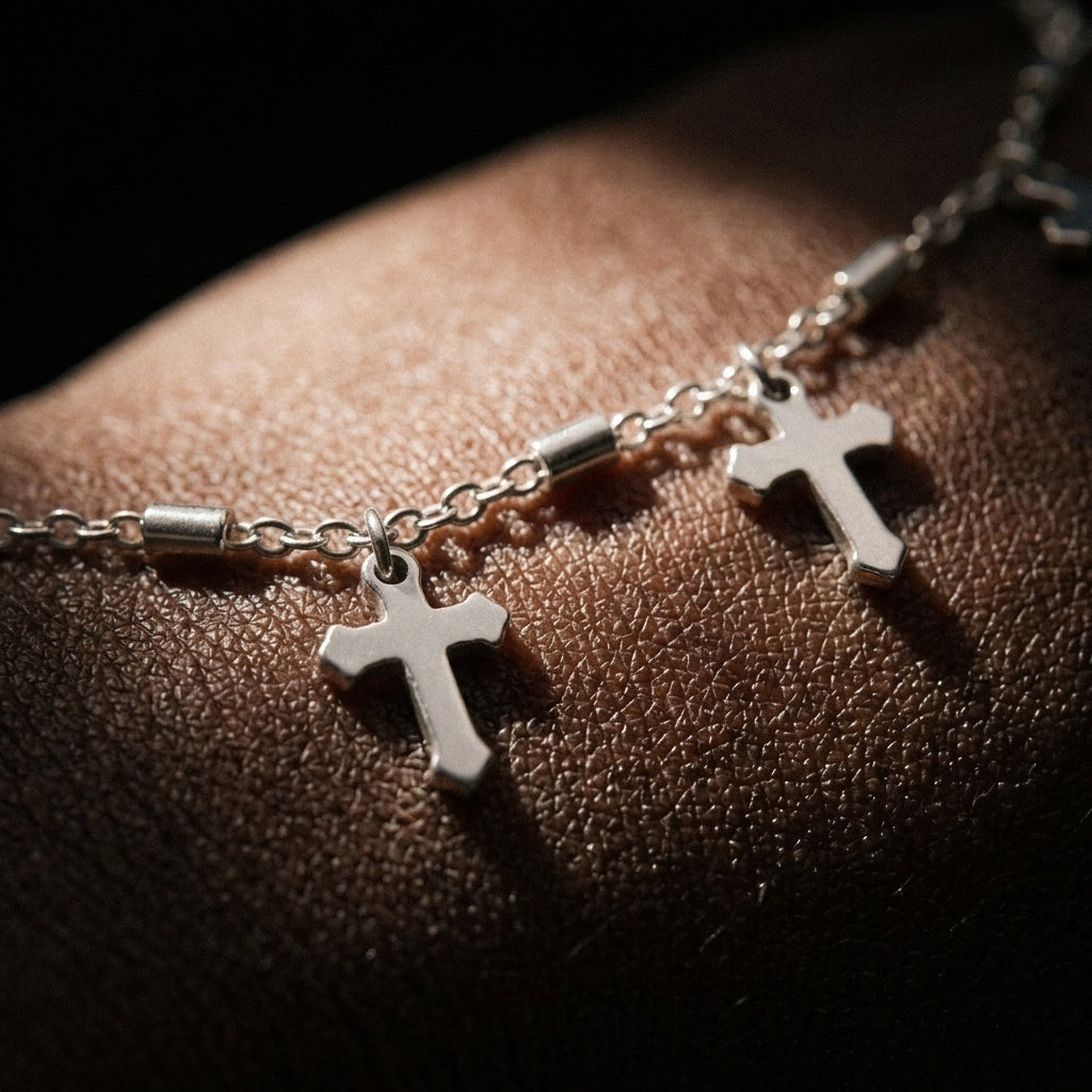 Five suspended cross charms