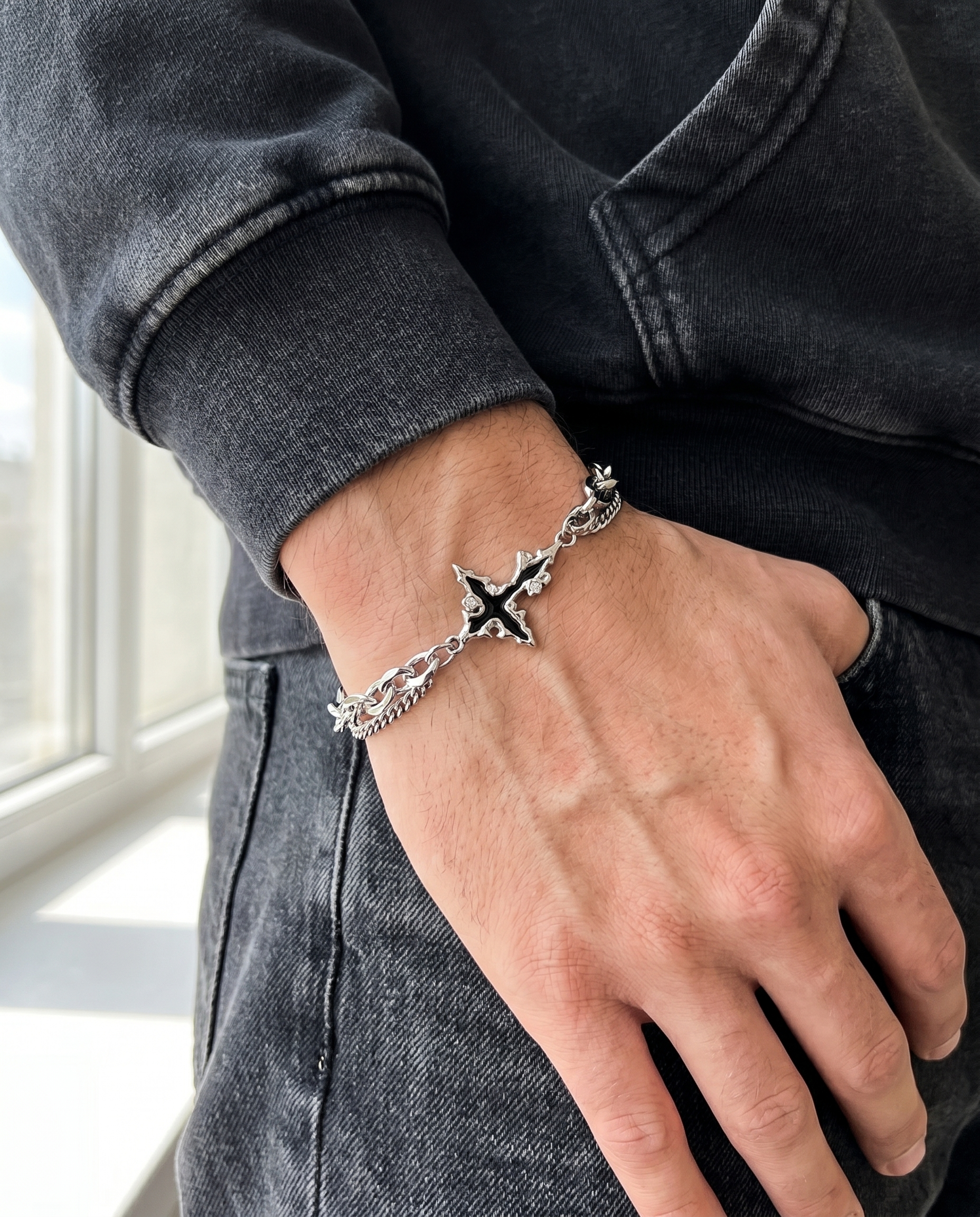 Vigil — silver chain, thorned 4-point star/cross charm