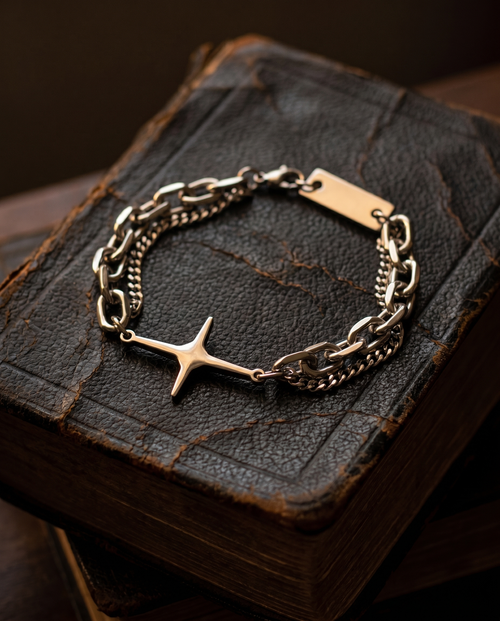 Dayspring — silver chain, radiant star/cross charm