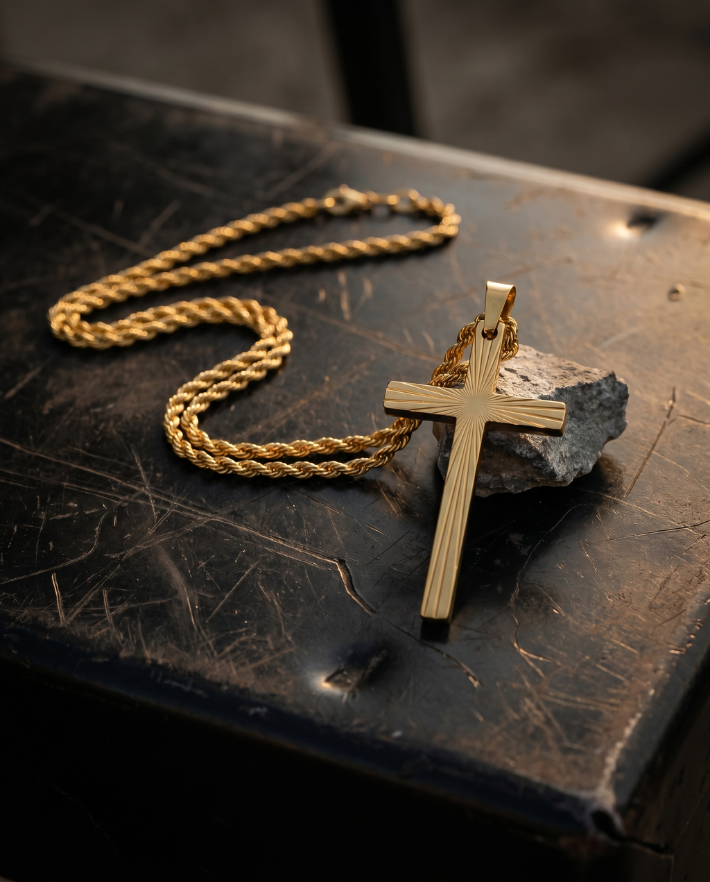 Sunrise — gold cross with radiant light burst