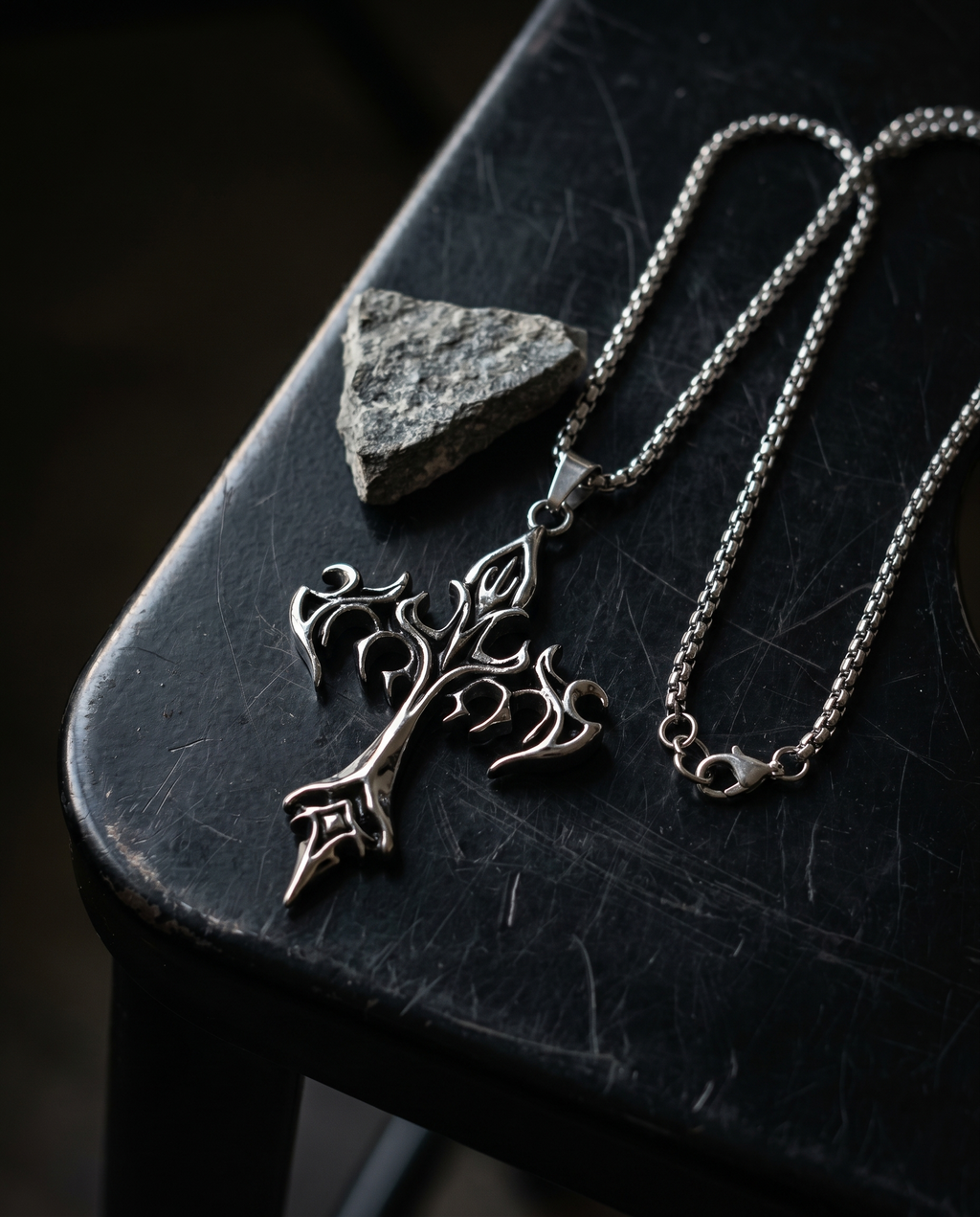 Tracery — silver ornate filigree gothic cross (no wings)