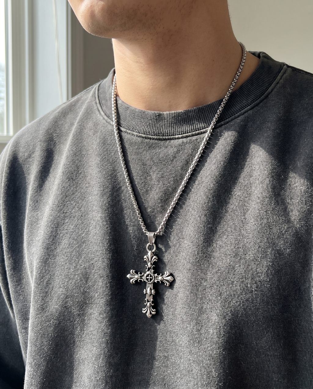Tracery — silver ornate filigree gothic cross (no wings)