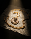 Halo — gold medallion, radiant Christ bust