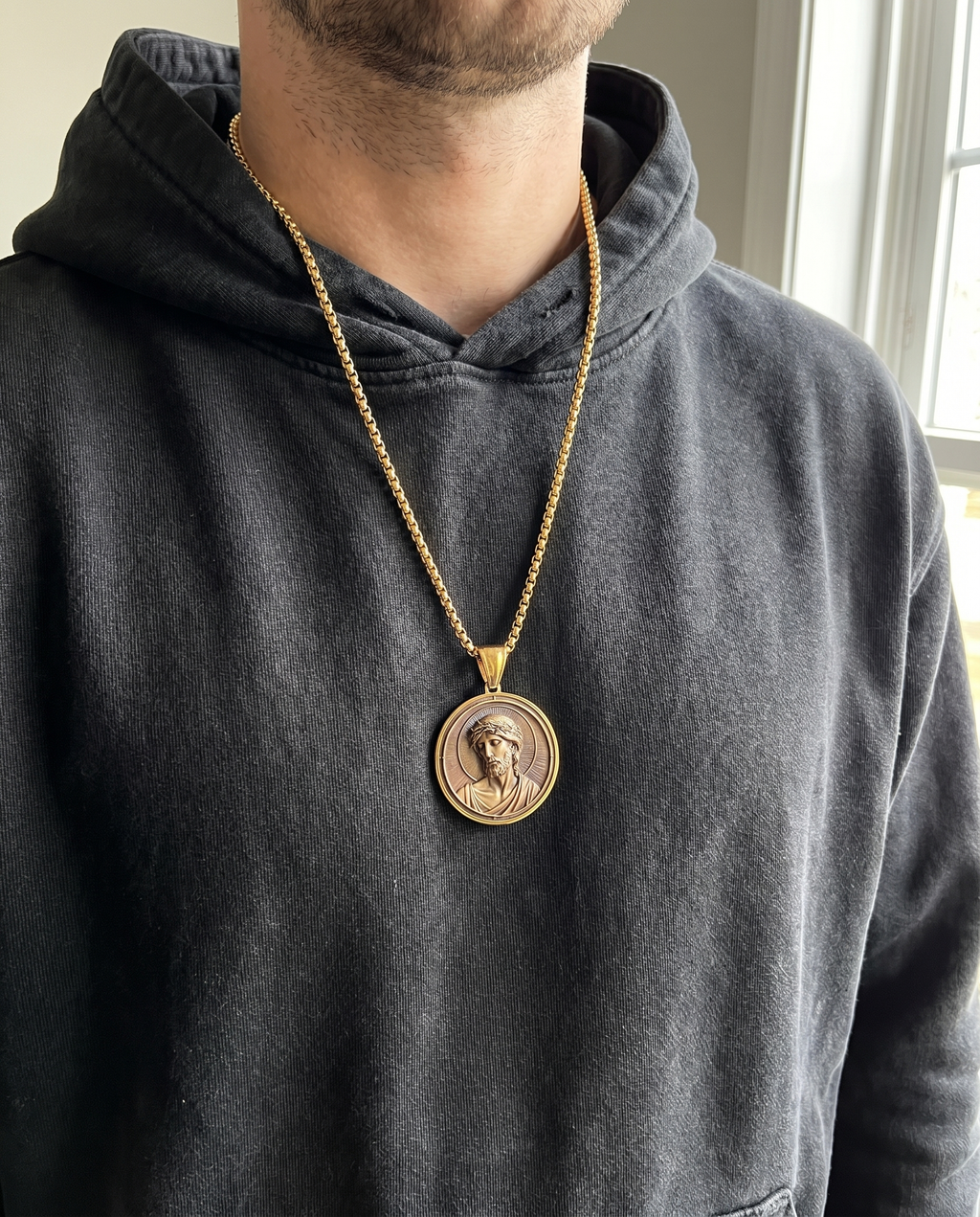 Halo — gold medallion, radiant Christ bust