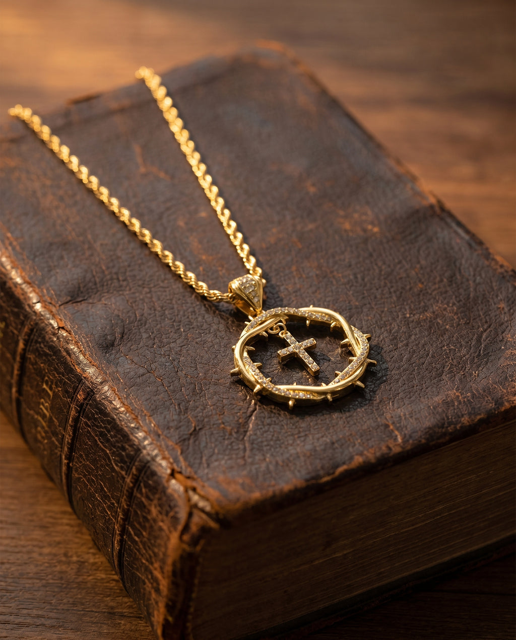 Crux — gold crown-of-thorns ring enclosing a cross