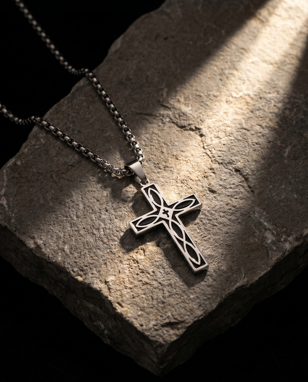 Eternum — silver cross with celtic knotwork