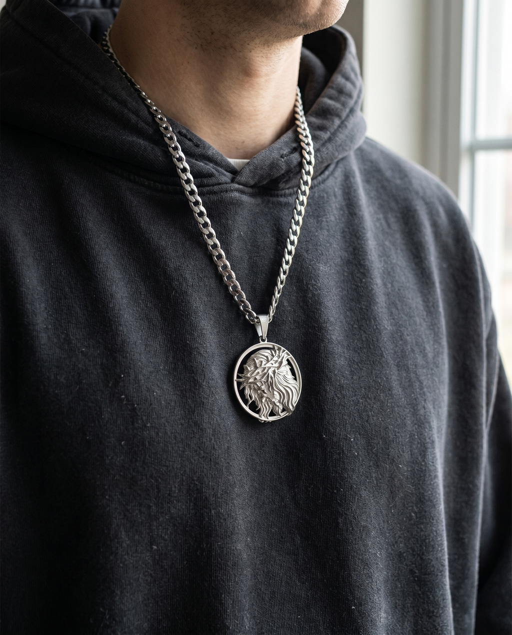 Steadfast — gold medallion, crowned Christ profile