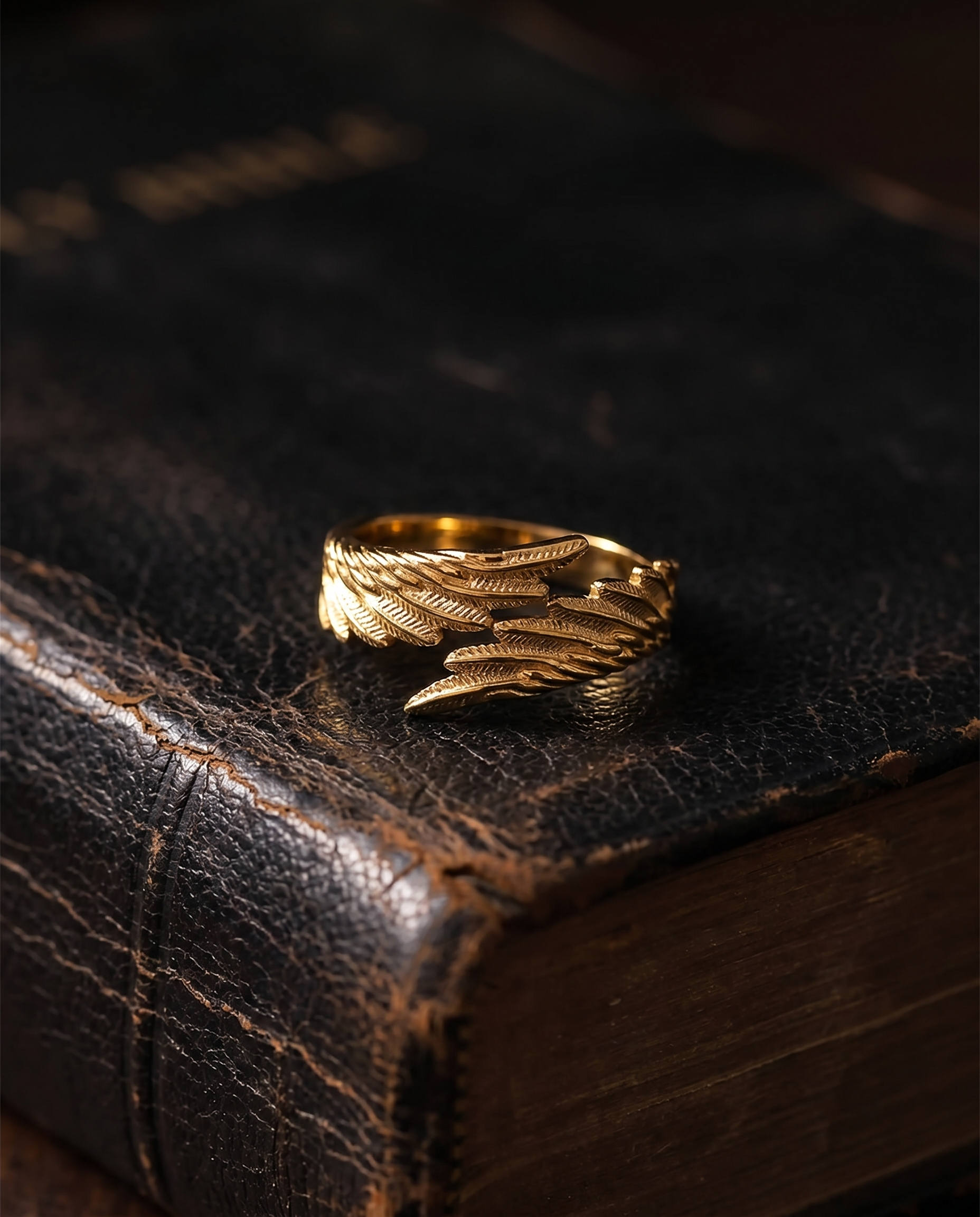 Refuge — gold wrap band, feathered angel wing