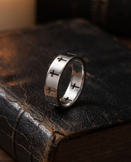 Devotion — gold pierced band of cut-out crosses