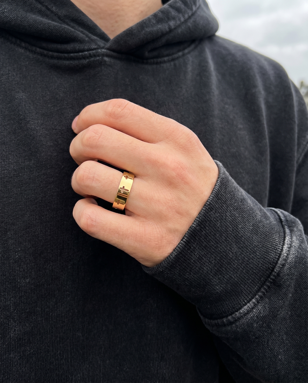 Devotion — gold pierced band of cut-out crosses