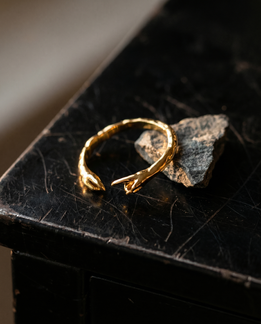 Worn into the hand.