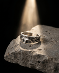 Inheritance — silver band, sculpted classical face