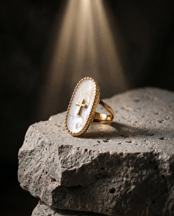 Inri — gold oval plaque, thin cross on mother-of-pearl
