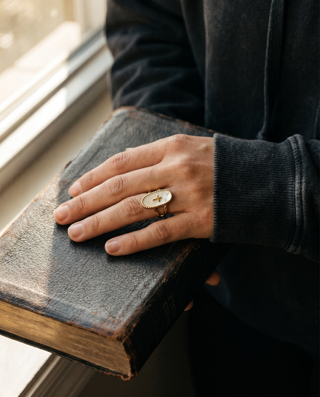 Inri — gold oval plaque, thin cross on mother-of-pearl