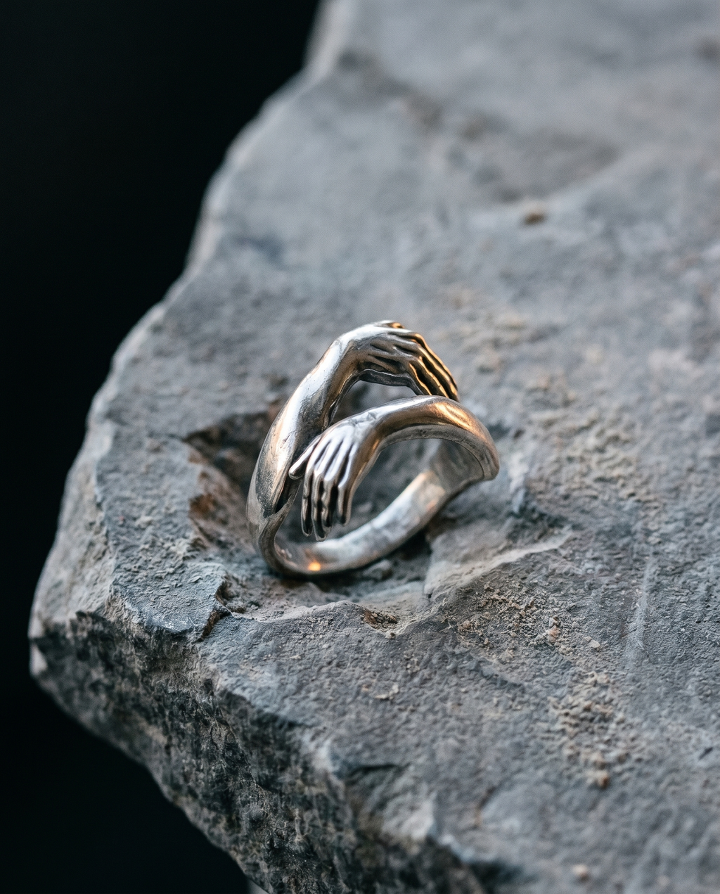 Covenant — gold sculptural band, TWO HANDS clasping