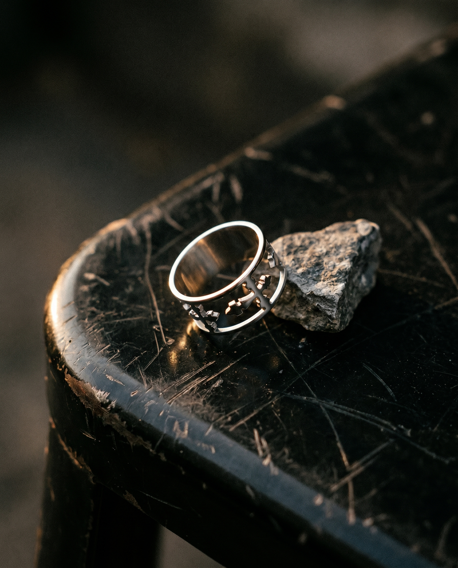 Worn into the hand.