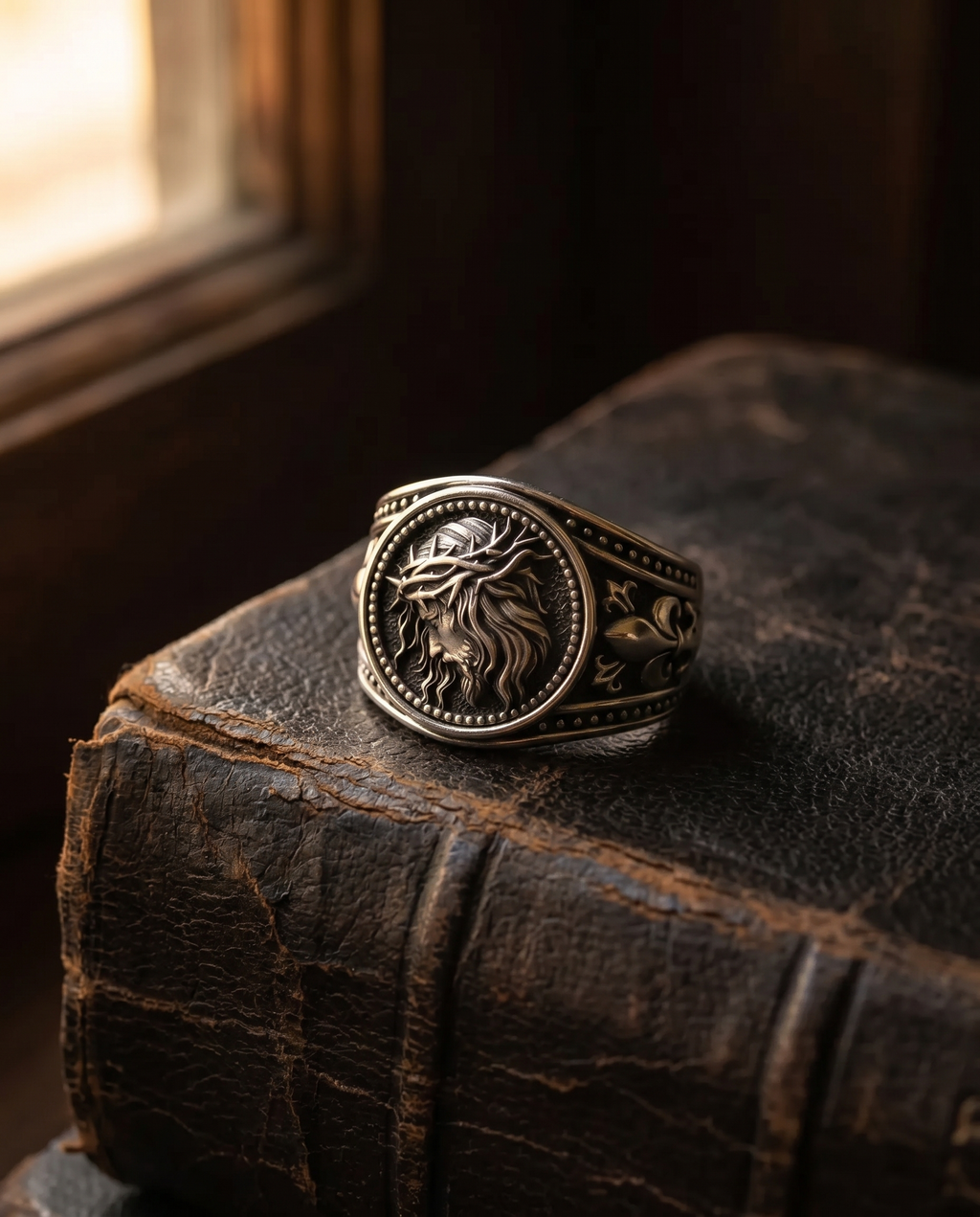 Conqueror — gold oval signet, roaring LION head